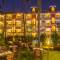 Отель Lazylagoon Sarovar Portico Suites