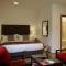 Отель Escala Hotel Suites