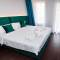 Отель Escala Hotel Suites