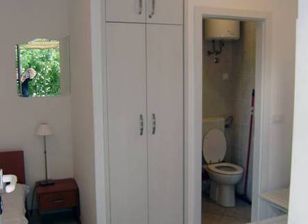 Отель Diocletian Apartments & Rooms 