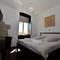 Отель Marmontova Luxury Rooms 