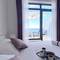 Отель Apartments La Perla 