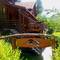 Отель The Log Cabin Minic 
