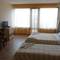 Отель Sunny Sands Studios 