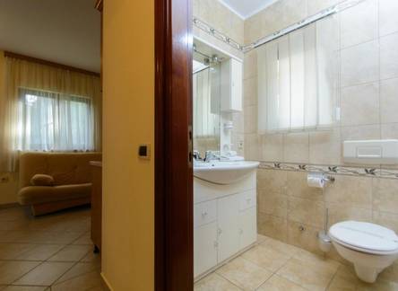 Отель Maca Apartments 
