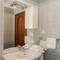 Отель Maca Apartments 