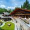 Отель Au Coeur Des Neiges Chalet Resort