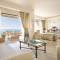 Отель Sani Asterias Suites