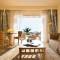Отель Sani Asterias Suites