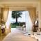 Отель Sani Asterias Suites
