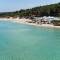 Отель Sani Beach Hotel & Spa