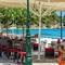 Отель Xenios Dolphin Beach Hotel