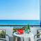 Отель Xenios Dolphin Beach Hotel