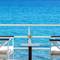 Отель Xenios Dolphin Beach Hotel