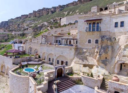 Отель Kayakapi Premium Caves Cappadocia