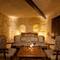 Отель Kayakapi Premium Caves Cappadocia