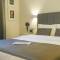 Отель AlQasr Metropole Hotel