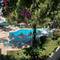 Отель Moonshine Hotel & Suites