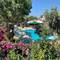 Отель Moonshine Hotel & Suites