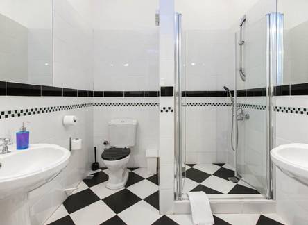 Отель Chiconomy Suites