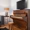 Отель Chiconomy Suites