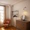 Отель Chiconomy Suites