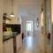 Отель Chiconomy Suites