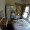 Отель Blue Eye Suites