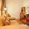Отель TomTom Suites - The Old Franciscan House