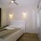 Отель Kondo Suites
