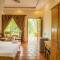 Отель CocoPalm Beach Resort & Spa