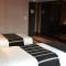 Отель Golden Tulip Mandison Suites