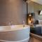 Отель Golden Tulip Mandison Suites