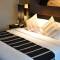 Отель Golden Tulip Mandison Suites