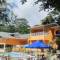 Отель Albizia Lodge Green Estate 
