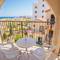 Отель Windmills Hotel Apartments