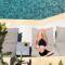 Отель La Stella Hotel Apartments Suites