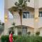 Отель La Stella Hotel Apartments Suites
