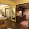 Отель Deltin Suites
