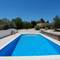 Отель Holiday home El Rinconcito L'Ampolla 