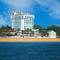 Отель The Quilon Beach Hotel and Convention Center 