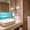 Отель Radisson Resort and Suites Phuket