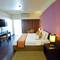 Отель The Color Living Hotel