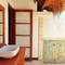 Отель Rhipidura Bungalows 