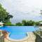 Отель Anda Amed Resort