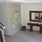 Отель Olana Beachfront Apartments