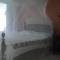 Отель Papillon Beach Apartments