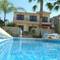Отель Vineland Holidays Villas