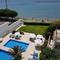Отель Les Sirenes Apartments