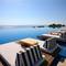 Отель Cavo Olympo Luxury Resort & Spa